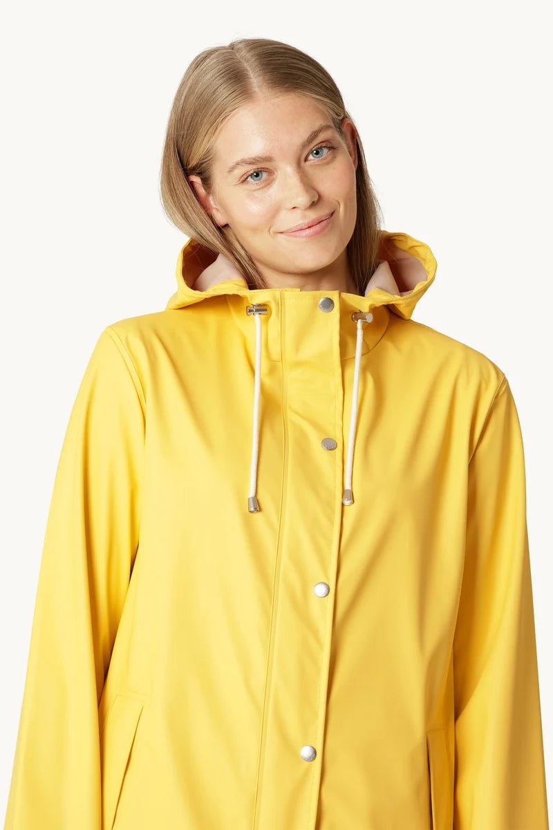 Light Lemondrop RaincoatPosh Boutique